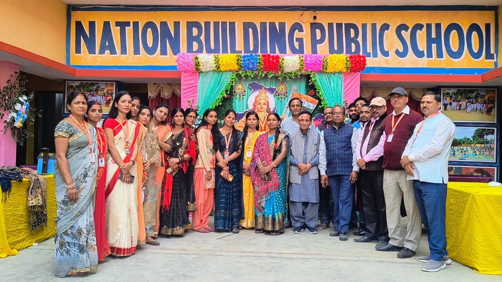 NBPS staff group photo under banner