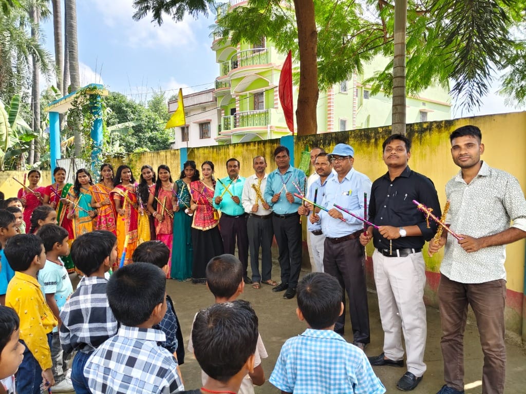 NBPS staff group with students and flags